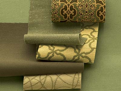 Fabric swatches in varying shades of greens